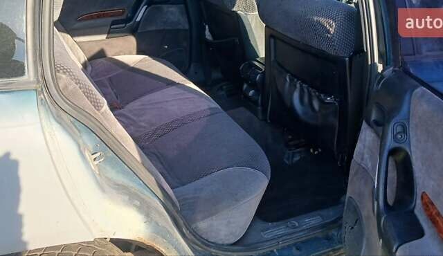 Зелений Опель Омега, об'ємом двигуна 2 л та пробігом 350 тис. км за 750 $, фото 2 на Automoto.ua