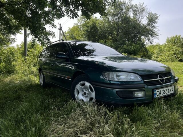 Зеленый Опель Омега, объемом двигателя 2.5 л и пробегом 290 тыс. км за 3200 $, фото 2 на Automoto.ua