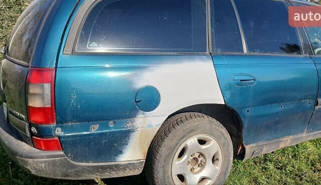 Зелений Опель Омега, об'ємом двигуна 2 л та пробігом 350 тис. км за 750 $, фото 3 на Automoto.ua