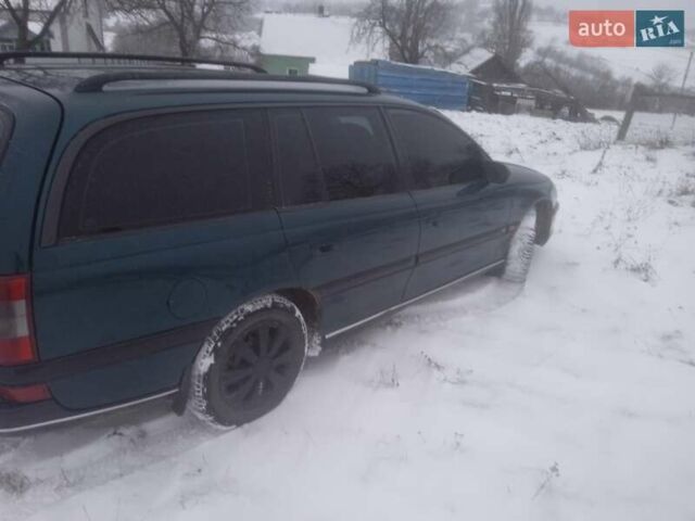Зелений Опель Омега, об'ємом двигуна 2 л та пробігом 425 тис. км за 2300 $, фото 2 на Automoto.ua