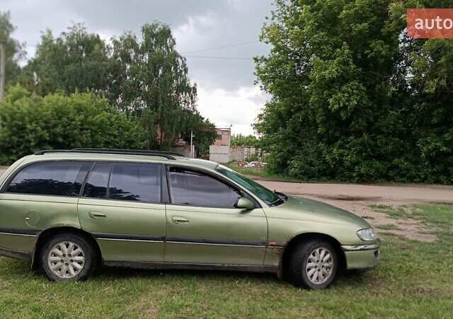 Зеленый Опель Омега, объемом двигателя 2 л и пробегом 267 тыс. км за 1599 $, фото 9 на Automoto.ua