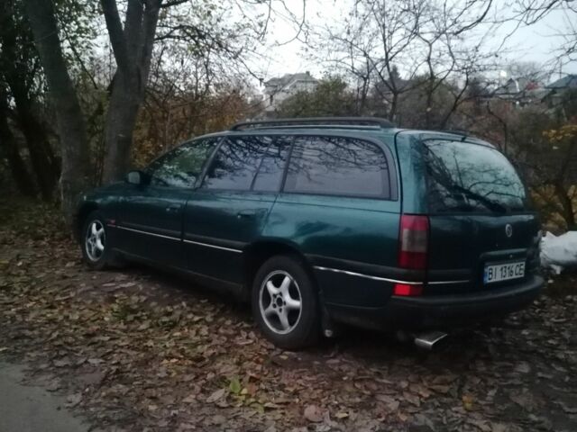 Зеленый Опель Омега, объемом двигателя 2.5 л и пробегом 204 тыс. км за 828 $, фото 1 на Automoto.ua