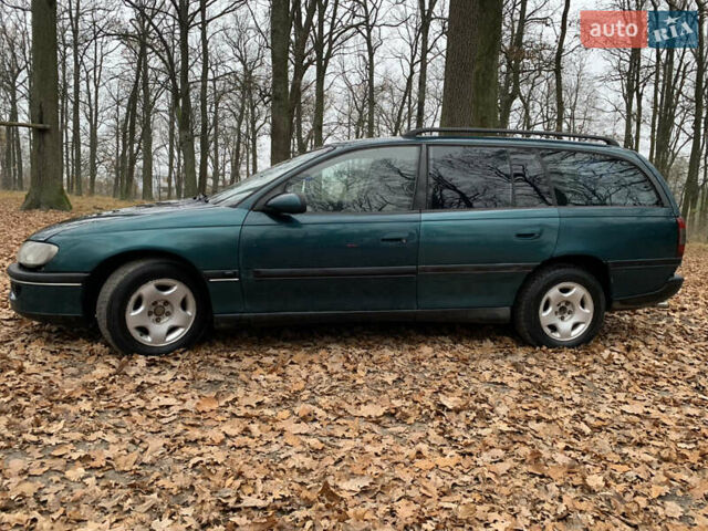 Зелений Опель Омега, об'ємом двигуна 2 л та пробігом 335 тис. км за 1550 $, фото 6 на Automoto.ua