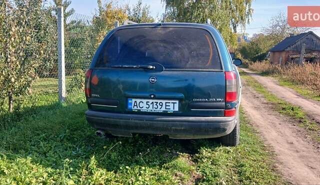 Зелений Опель Омега, об'ємом двигуна 2 л та пробігом 350 тис. км за 750 $, фото 6 на Automoto.ua