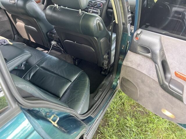 Зеленый Опель Омега, объемом двигателя 2.5 л и пробегом 290 тыс. км за 3200 $, фото 7 на Automoto.ua