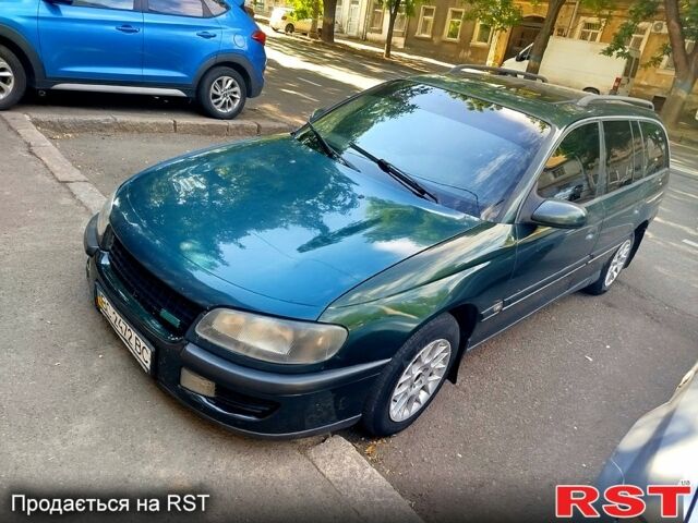 Зеленый Опель Омега, объемом двигателя 2.5 л и пробегом 381 тыс. км за 2000 $, фото 1 на Automoto.ua