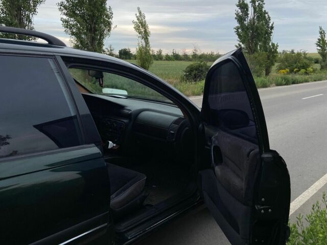 Зелений Опель Омега, об'ємом двигуна 2 л та пробігом 380 тис. км за 2214 $, фото 2 на Automoto.ua