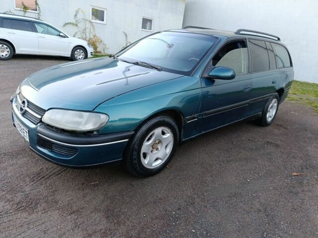 Зеленый Опель Омега, объемом двигателя 2 л и пробегом 327 тыс. км за 1050 $, фото 3 на Automoto.ua