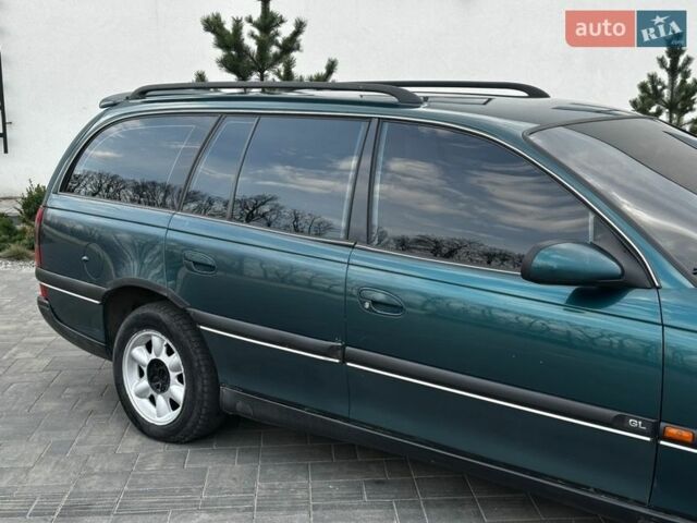 Зеленый Опель Омега, объемом двигателя 2.5 л и пробегом 200 тыс. км за 1850 $, фото 7 на Automoto.ua