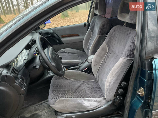 Зелений Опель Омега, об'ємом двигуна 2 л та пробігом 335 тис. км за 1550 $, фото 7 на Automoto.ua