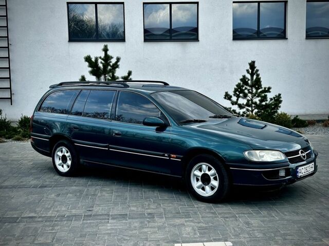 Зелений Опель Омега, об'ємом двигуна 2.5 л та пробігом 372 тис. км за 1850 $, фото 7 на Automoto.ua