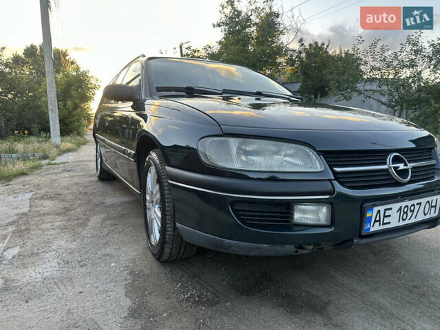 Зеленый Опель Омега, объемом двигателя 2 л и пробегом 432 тыс. км за 3900 $, фото 3 на Automoto.ua