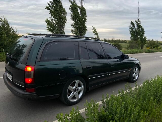 Зелений Опель Омега, об'ємом двигуна 2 л та пробігом 380 тис. км за 2214 $, фото 3 на Automoto.ua