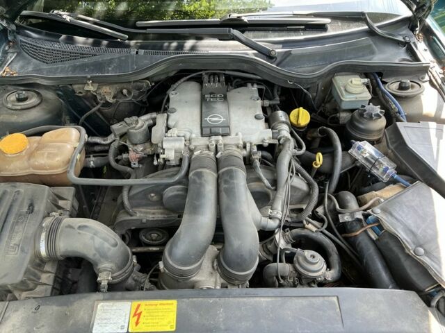 Зеленый Опель Омега, объемом двигателя 2.5 л и пробегом 290 тыс. км за 3200 $, фото 15 на Automoto.ua