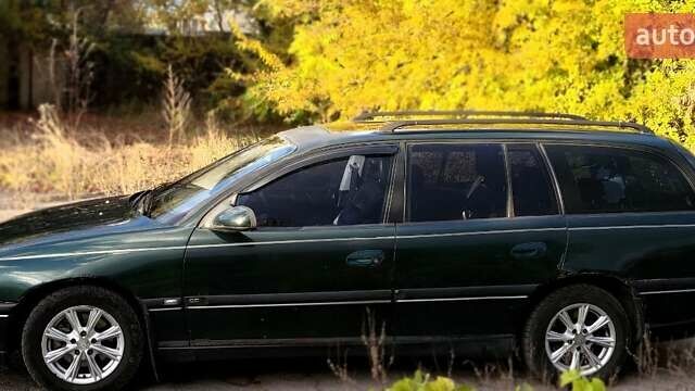 Зеленый Опель Омега, объемом двигателя 2 л и пробегом 484 тыс. км за 2000 $, фото 1 на Automoto.ua