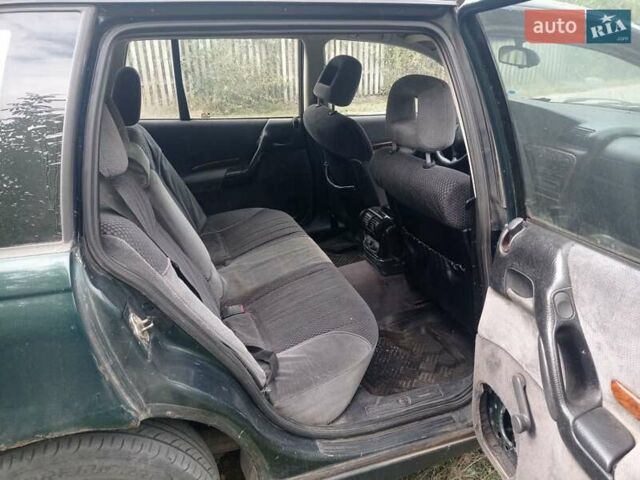 Зеленый Опель Омега, объемом двигателя 2 л и пробегом 400 тыс. км за 1200 $, фото 1 на Automoto.ua