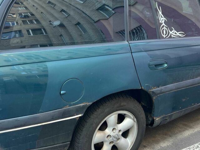 Зеленый Опель Омега, объемом двигателя 2 л и пробегом 1 тыс. км за 1200 $, фото 4 на Automoto.ua