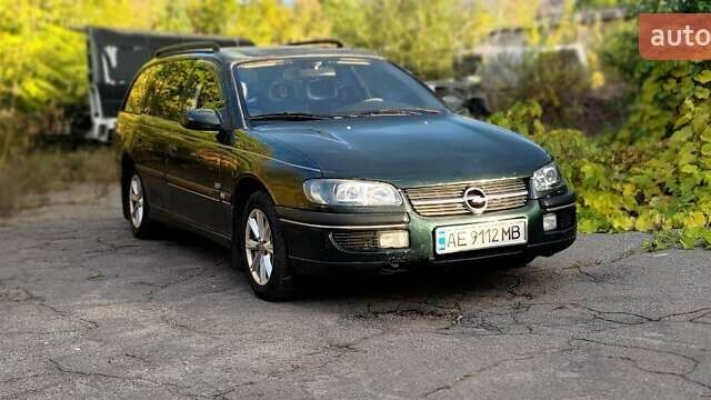 Зеленый Опель Омега, объемом двигателя 2 л и пробегом 484 тыс. км за 2000 $, фото 8 на Automoto.ua