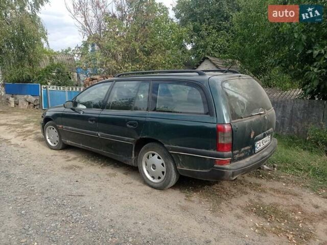 Зеленый Опель Омега, объемом двигателя 2 л и пробегом 400 тыс. км за 1200 $, фото 5 на Automoto.ua