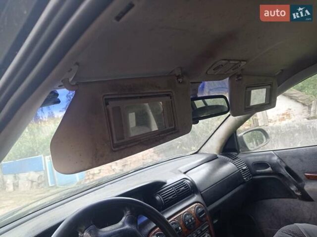 Зеленый Опель Омега, объемом двигателя 2 л и пробегом 400 тыс. км за 1200 $, фото 27 на Automoto.ua