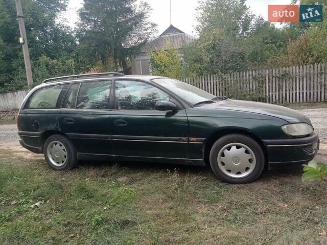 Зеленый Опель Омега, объемом двигателя 2 л и пробегом 400 тыс. км за 1200 $, фото 9 на Automoto.ua