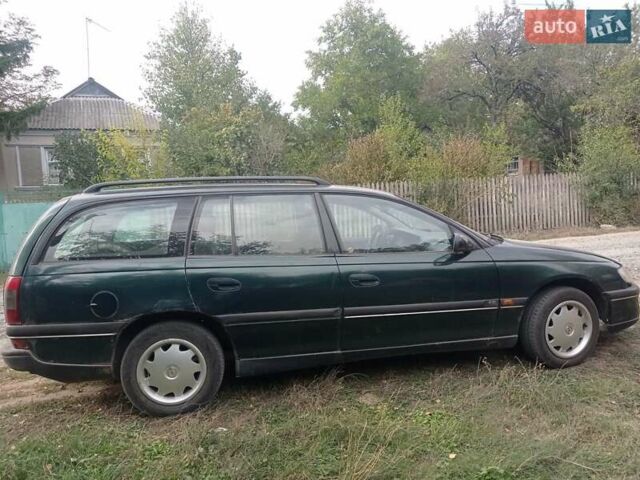 Зеленый Опель Омега, объемом двигателя 2 л и пробегом 400 тыс. км за 1200 $, фото 3 на Automoto.ua