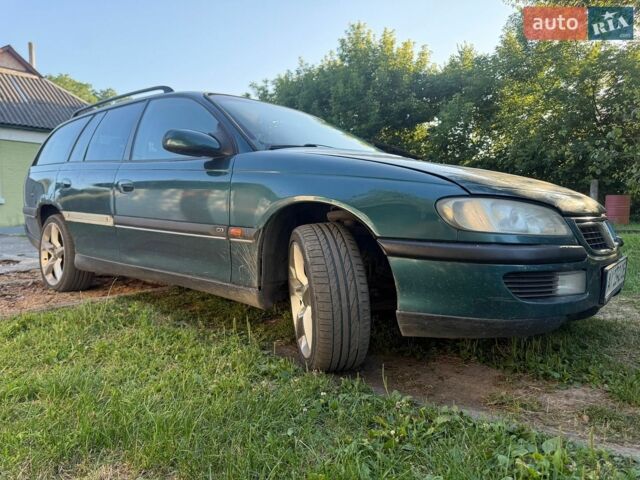 Зелений Опель Омега, об'ємом двигуна 2.5 л та пробігом 400 тис. км за 2499 $, фото 2 на Automoto.ua