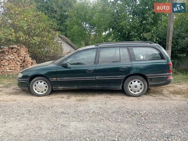 Зеленый Опель Омега, объемом двигателя 2 л и пробегом 400 тыс. км за 1200 $, фото 8 на Automoto.ua