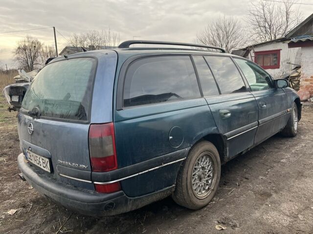 Зеленый Опель Омега, объемом двигателя 2 л и пробегом 280 тыс. км за 1500 $, фото 2 на Automoto.ua
