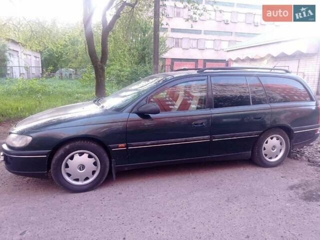 Зеленый Опель Омега, объемом двигателя 2 л и пробегом 377 тыс. км за 2500 $, фото 1 на Automoto.ua