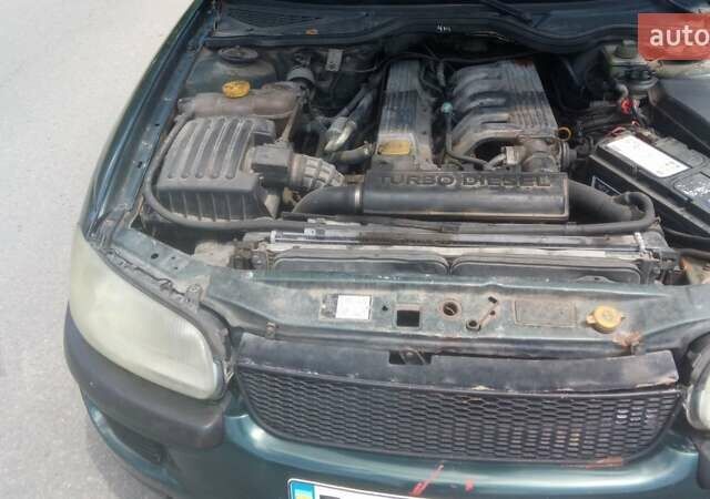 Зеленый Опель Омега, объемом двигателя 2.5 л и пробегом 386 тыс. км за 2000 $, фото 2 на Automoto.ua