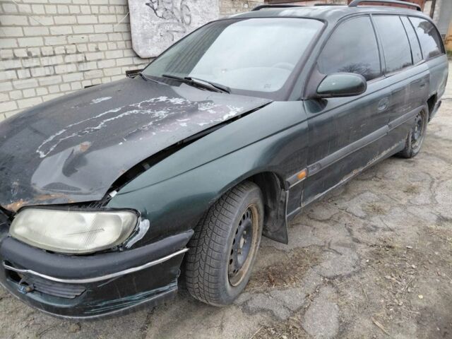 Зеленый Опель Омега, объемом двигателя 2 л и пробегом 300 тыс. км за 350 $, фото 8 на Automoto.ua