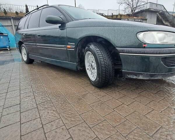 Зеленый Опель Омега, объемом двигателя 2 л и пробегом 460 тыс. км за 1600 $, фото 7 на Automoto.ua