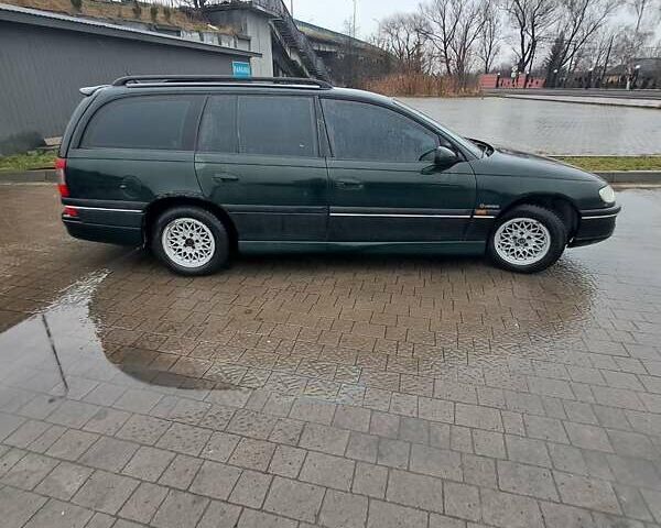 Зеленый Опель Омега, объемом двигателя 2 л и пробегом 460 тыс. км за 1600 $, фото 10 на Automoto.ua