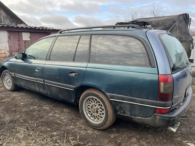 Зеленый Опель Омега, объемом двигателя 2 л и пробегом 280 тыс. км за 1500 $, фото 3 на Automoto.ua
