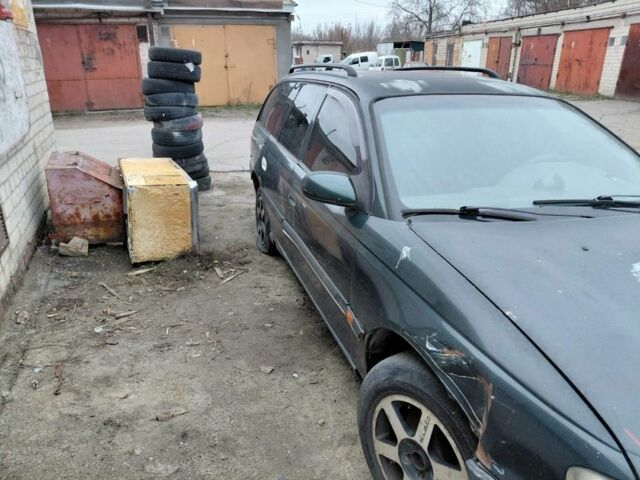 Зеленый Опель Омега, объемом двигателя 2 л и пробегом 300 тыс. км за 350 $, фото 2 на Automoto.ua