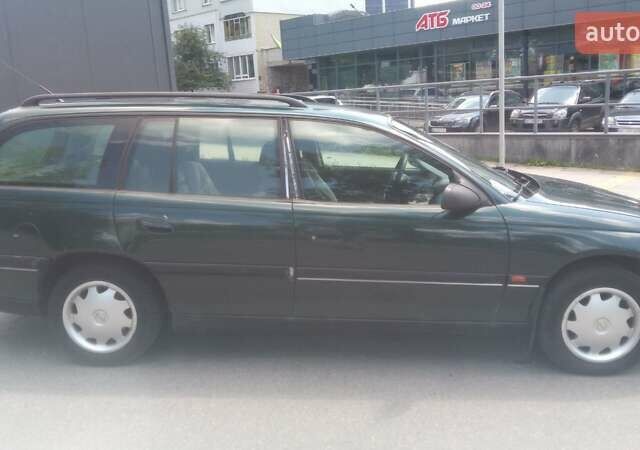 Зеленый Опель Омега, объемом двигателя 2.5 л и пробегом 386 тыс. км за 2000 $, фото 8 на Automoto.ua