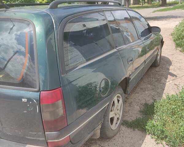 Опель Омега 1997 у Харкові на Automoto.ua Зелений Опель Омега, об'ємом двигуна 2 л та пробігом 308 тис. км за 1500 $, фото 2 на Automoto.ua