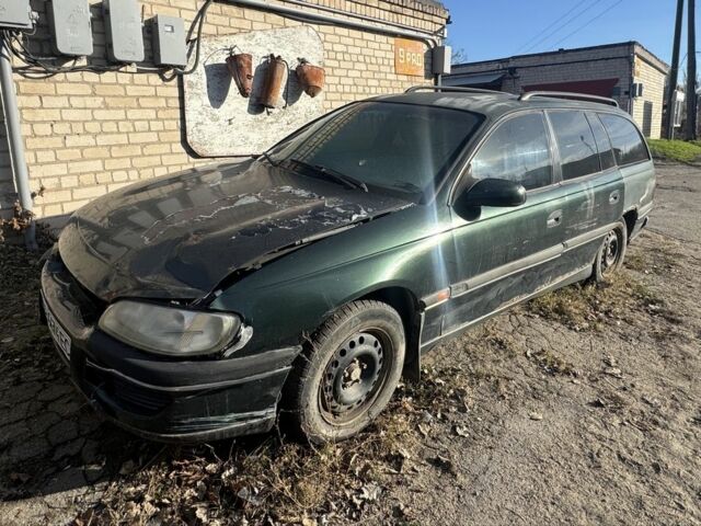 Зелений Опель Омега, об'ємом двигуна 2 л та пробігом 300 тис. км за 370 $, фото 3 на Automoto.ua