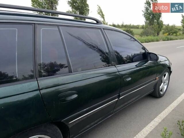 Зелений Опель Омега, об'ємом двигуна 2 л та пробігом 380 тис. км за 2210 $, фото 2 на Automoto.ua