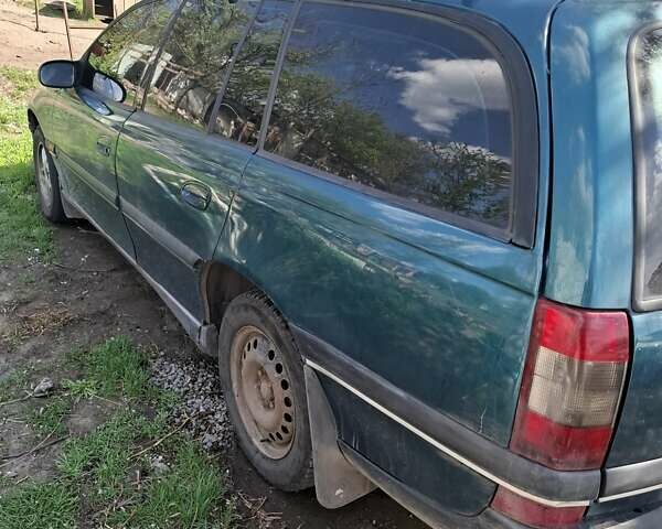 Зеленый Опель Омега, объемом двигателя 2 л и пробегом 318 тыс. км за 2600 $, фото 4 на Automoto.ua