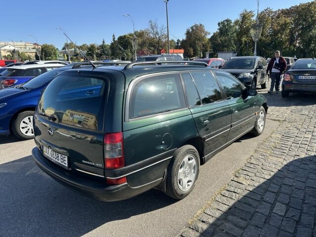 Зелений Опель Омега, об'ємом двигуна 2 л та пробігом 253 тис. км за 2850 $, фото 3 на Automoto.ua