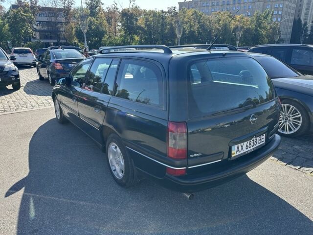 Зелений Опель Омега, об'ємом двигуна 2 л та пробігом 253 тис. км за 2850 $, фото 1 на Automoto.ua