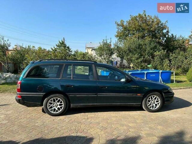 Зеленый Опель Омега, объемом двигателя 2 л и пробегом 240 тыс. км за 2900 $, фото 11 на Automoto.ua