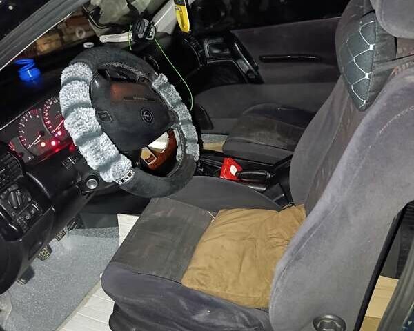 Зеленый Опель Омега, объемом двигателя 2 л и пробегом 250 тыс. км за 3100 $, фото 8 на Automoto.ua