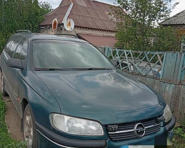 Зеленый Опель Омега, объемом двигателя 2 л и пробегом 330 тыс. км за 2400 $, фото 2 на Automoto.ua