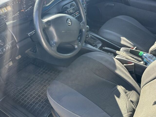 Зелений Опель Омега, об'ємом двигуна 2 л та пробігом 253 тис. км за 2850 $, фото 5 на Automoto.ua