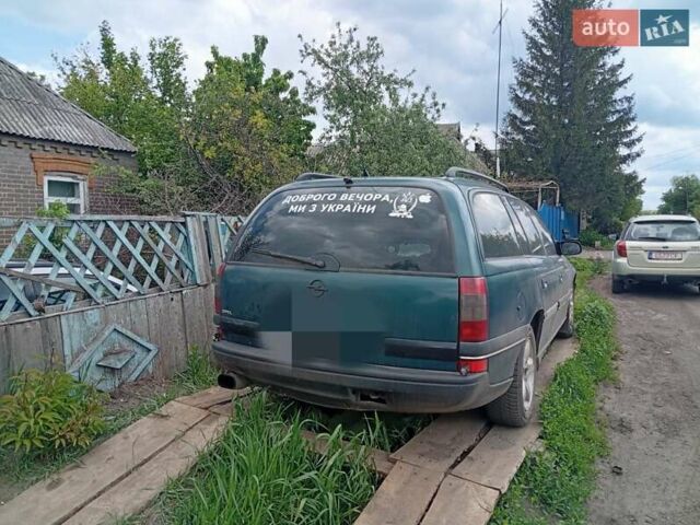 Зеленый Опель Омега, объемом двигателя 2 л и пробегом 330 тыс. км за 2400 $, фото 7 на Automoto.ua