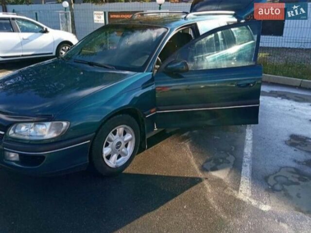 Зеленый Опель Омега, объемом двигателя 2 л и пробегом 354 тыс. км за 2950 $, фото 18 на Automoto.ua