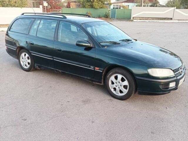 Зеленый Опель Омега, объемом двигателя 2 л и пробегом 352 тыс. км за 2200 $, фото 2 на Automoto.ua